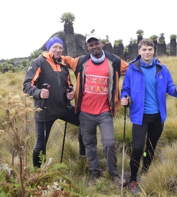 Trekkers during a 6-day Marangu route Kilimanjaro luxury trekking tour